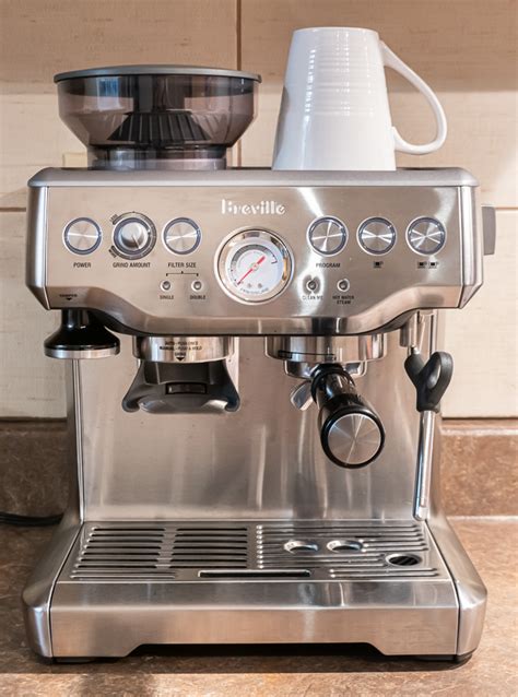 Fill the water reservoir with water and put it back on the coffee maker. . Breville espresso machine cleaning cycle